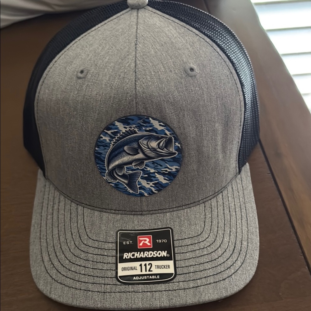 Centennial supply company Richardson Gray and Black Trucker Hat